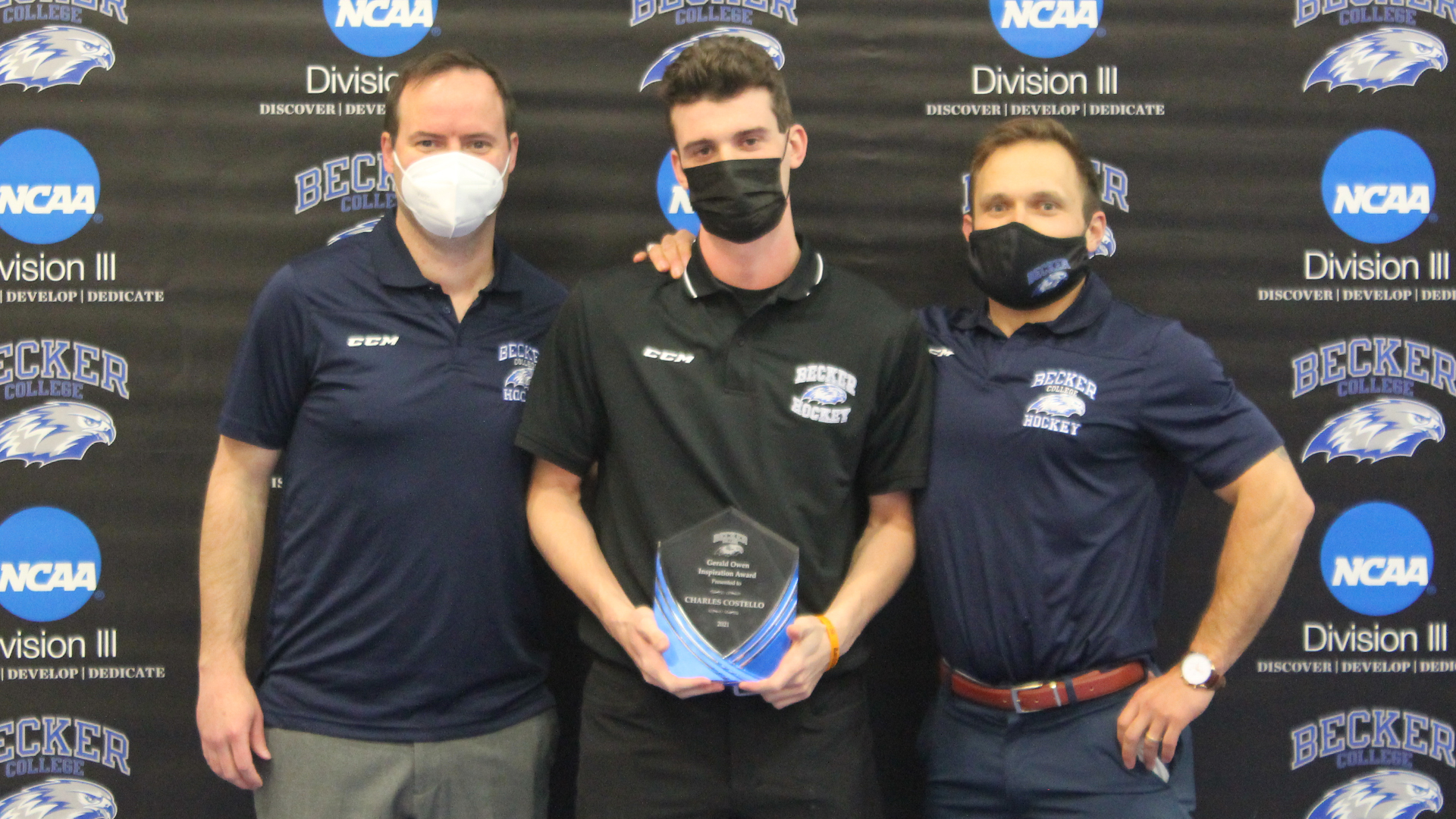 Charles Costello Accepting the Gerald Owen Inspiration Award from his coaches. One of many awards given to Hawks student-athletes during the ceremony.