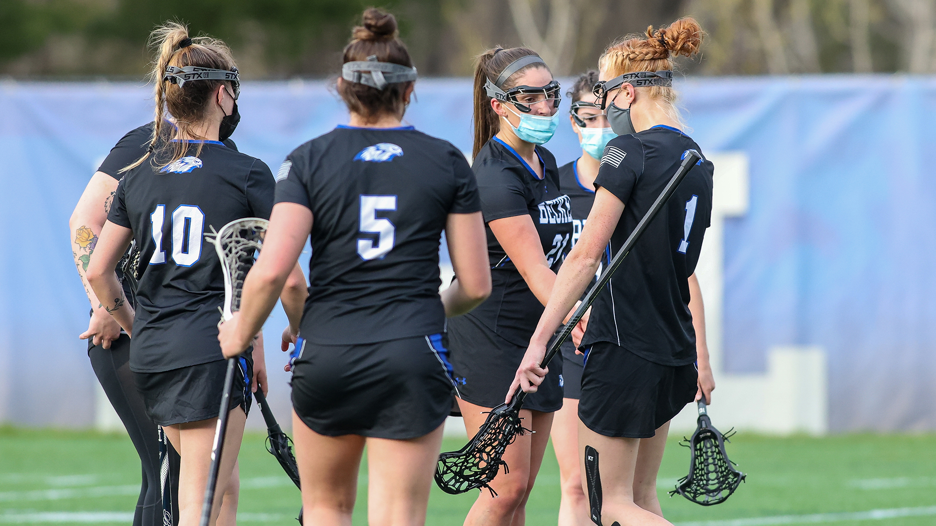 Hawks team celebrating after a goal